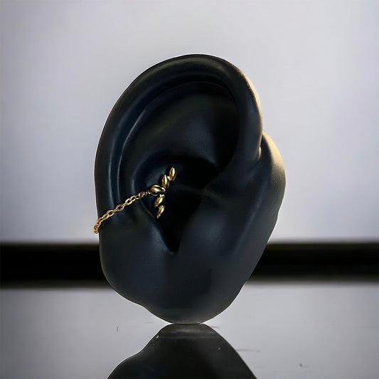 ensemble bijoux piercing oreille titane chainette et labret gold